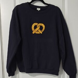 KULE Navy Sweater with Yellow Pretzel Design